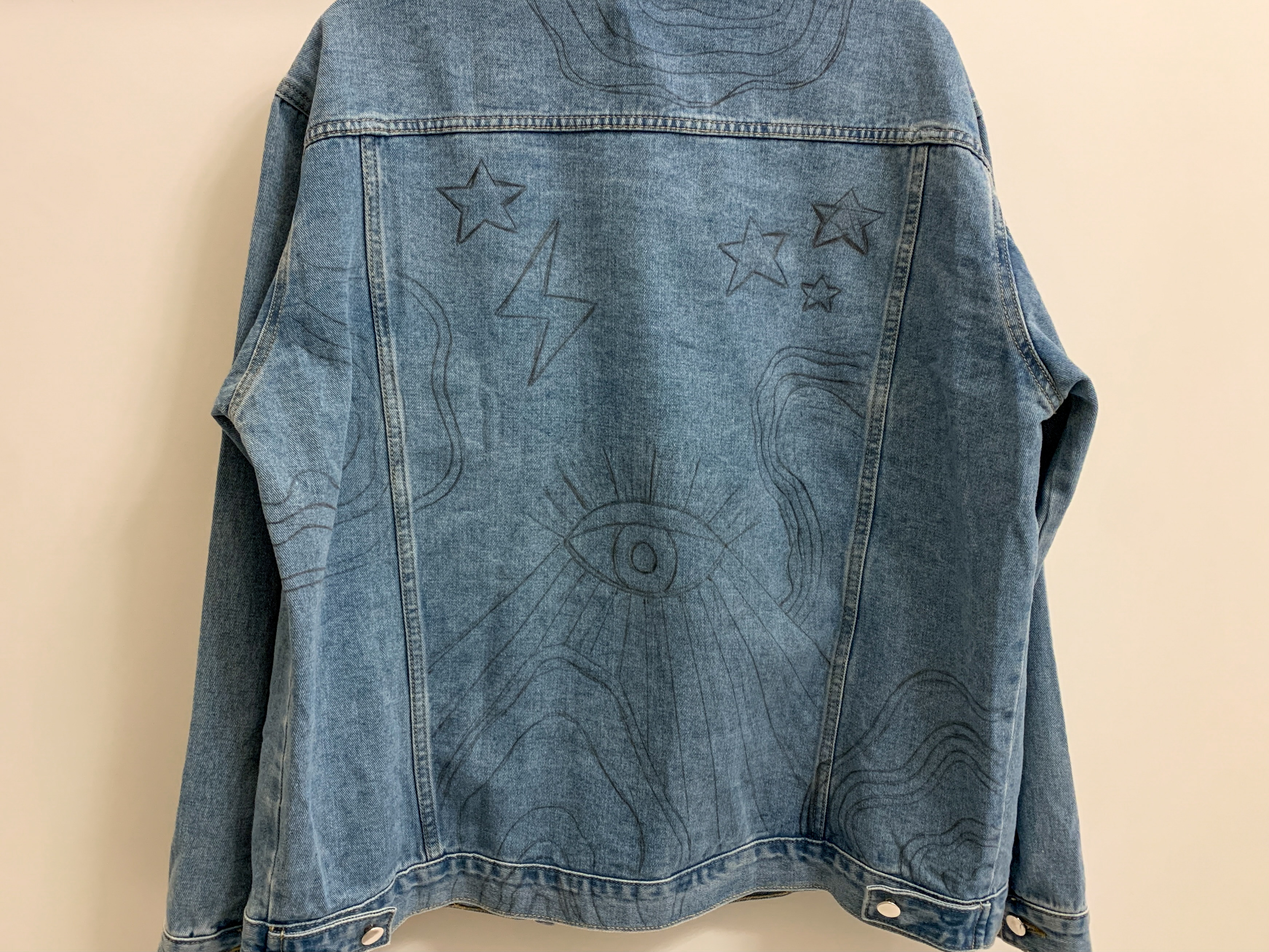 jacket with pencil drawing on it